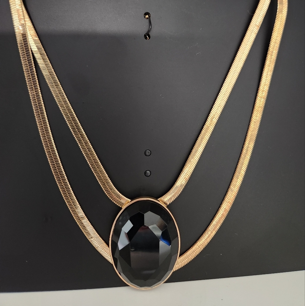 Thalia Sodi Elegant strands of gold herringbone Necklace Black oval pendant